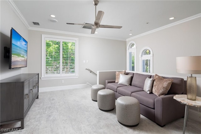 living area featuring visible vents, baseboards, ceiling fan, crown molding, and recessed lighting