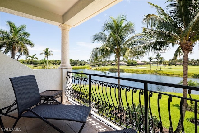 balcony featuring a water view