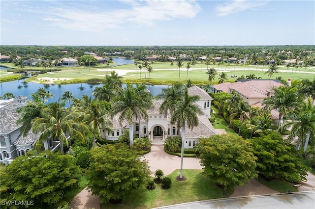 aerial view featuring a water view and view of golf course