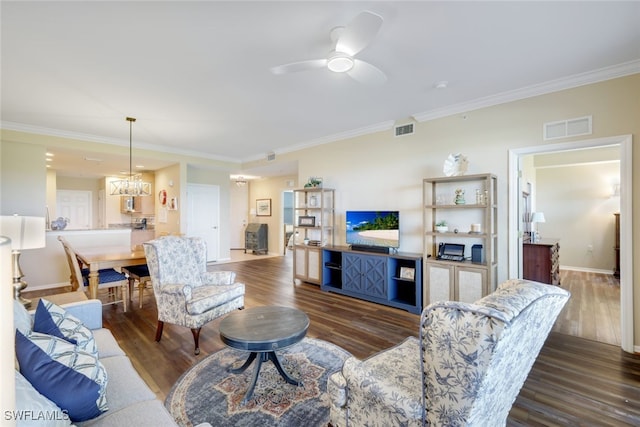 living room featuring crown molding, dark hardwood / wood-style floors, and ceiling fan