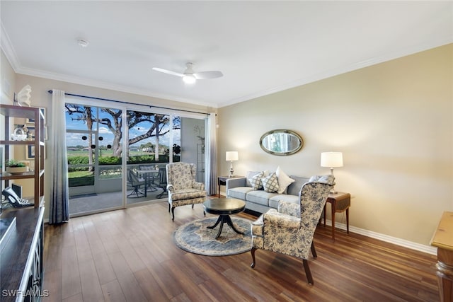 living room featuring hardwood / wood-style flooring, ceiling fan, and ornamental molding