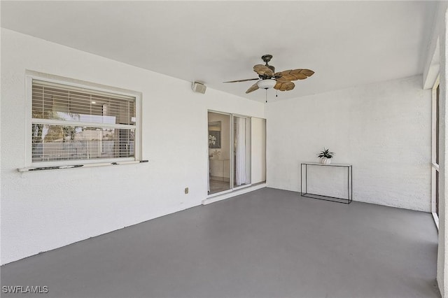 view of patio / terrace featuring ceiling fan