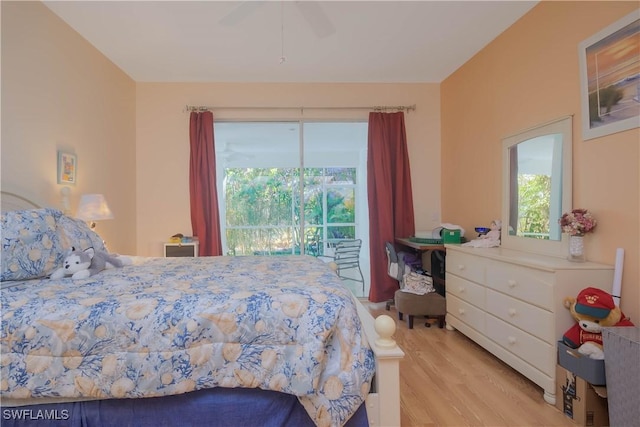 bedroom featuring access to exterior, ceiling fan, and light wood finished floors