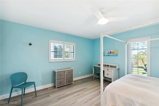 bedroom featuring ceiling fan and light wood-type flooring