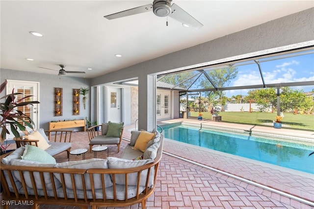 view of swimming pool featuring ceiling fan