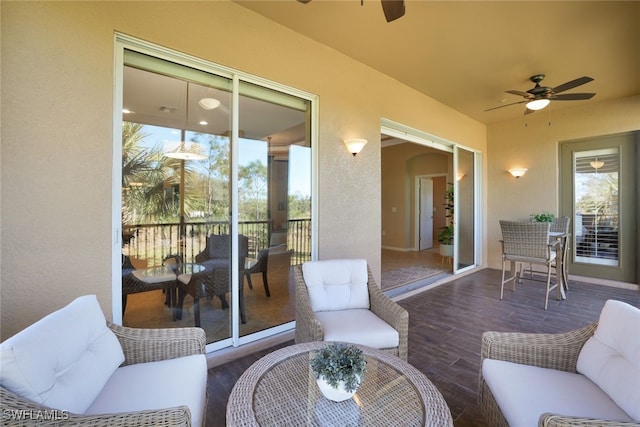 exterior space featuring ceiling fan