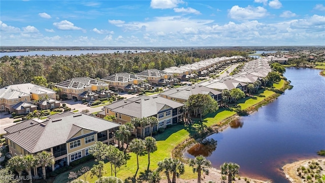 drone / aerial view featuring a water view