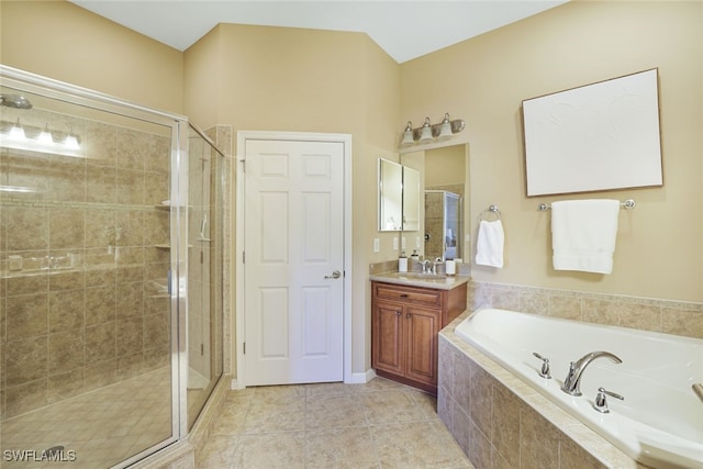 bathroom featuring vanity, separate shower and tub, and tile patterned flooring