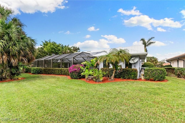 view of yard with a lanai