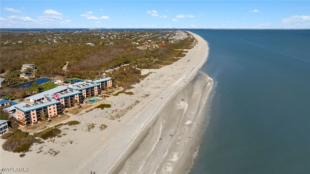 aerial view with a view of the beach and a water view