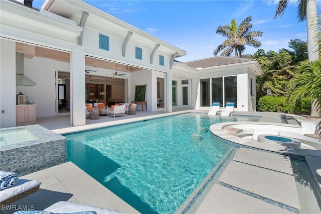 pool featuring an outdoor hangout area, an in ground hot tub, a patio area, and a ceiling fan