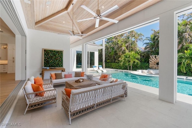 sunroom with ceiling fan, lofted ceiling, a swimming pool, and wooden ceiling