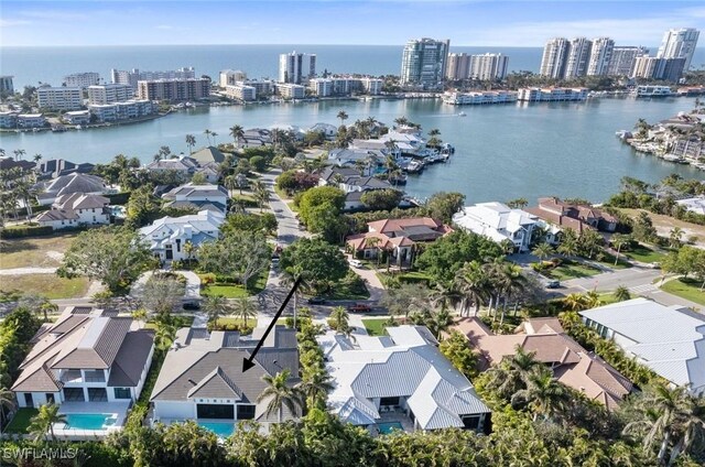 bird's eye view with a water view