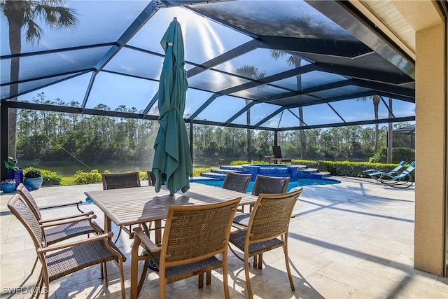 view of patio featuring a swimming pool with hot tub and glass enclosure