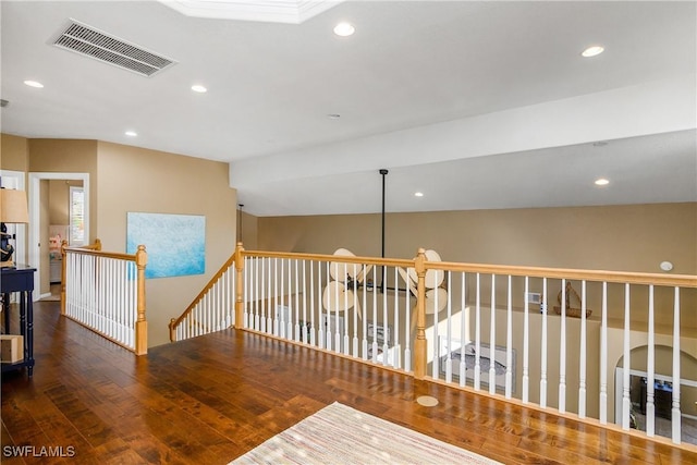 hall with dark hardwood / wood-style floors