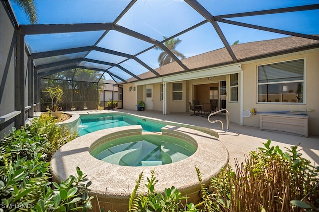 10347 Wood Ibis Ave, Bonita Springs, FL 34135 - view of pool featuring a patio and a pool with connected hot tub