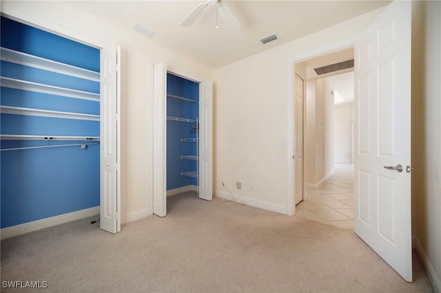 10347 Wood Ibis Ave, Bonita Springs, FL 34135 - unfurnished bedroom with visible vents, a ceiling fan, and carpet