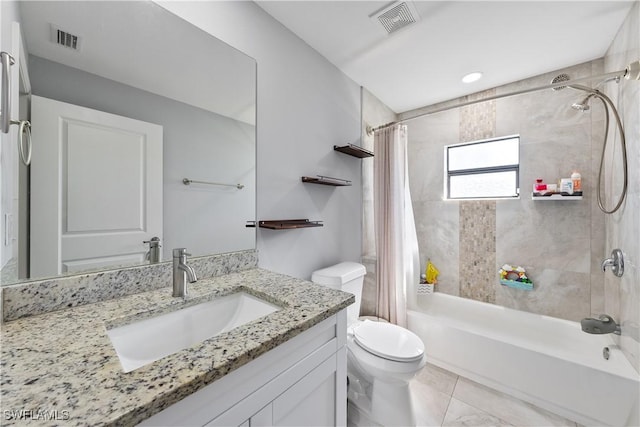 full bathroom featuring vanity, toilet, and shower / tub combo with curtain