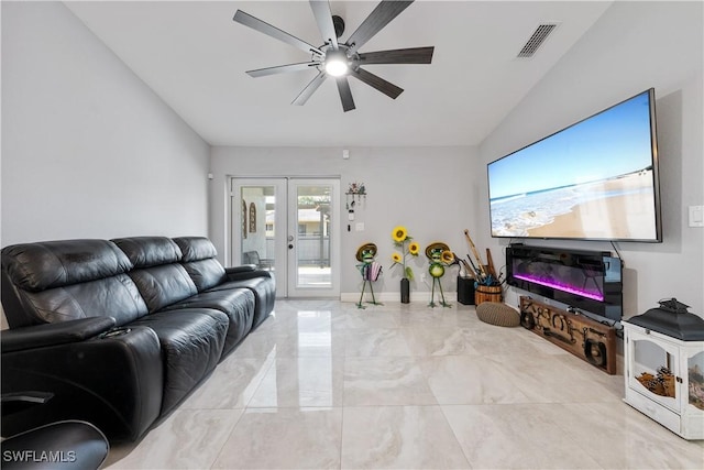 living room featuring vaulted ceiling, french doors, and ceiling fan