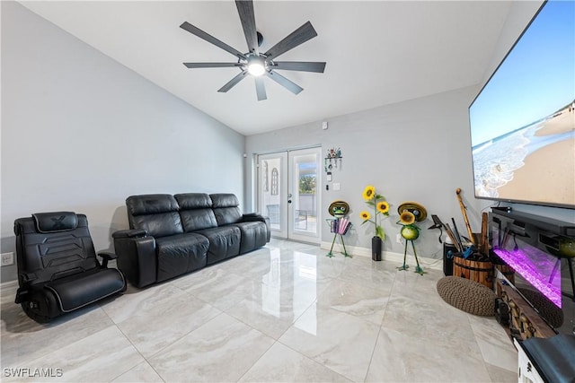 living room featuring vaulted ceiling, ceiling fan, and french doors