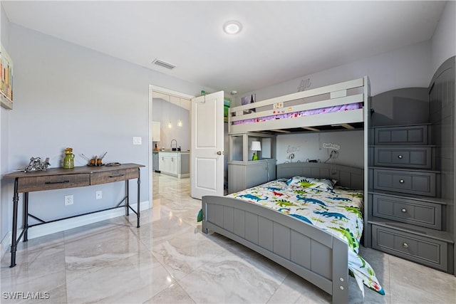 bedroom with sink