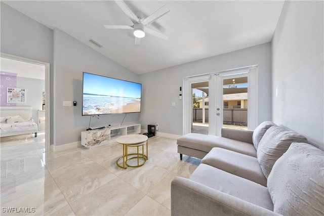 living room featuring french doors, ceiling fan, and vaulted ceiling