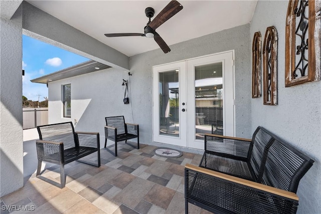 view of patio with outdoor lounge area, ceiling fan, and french doors