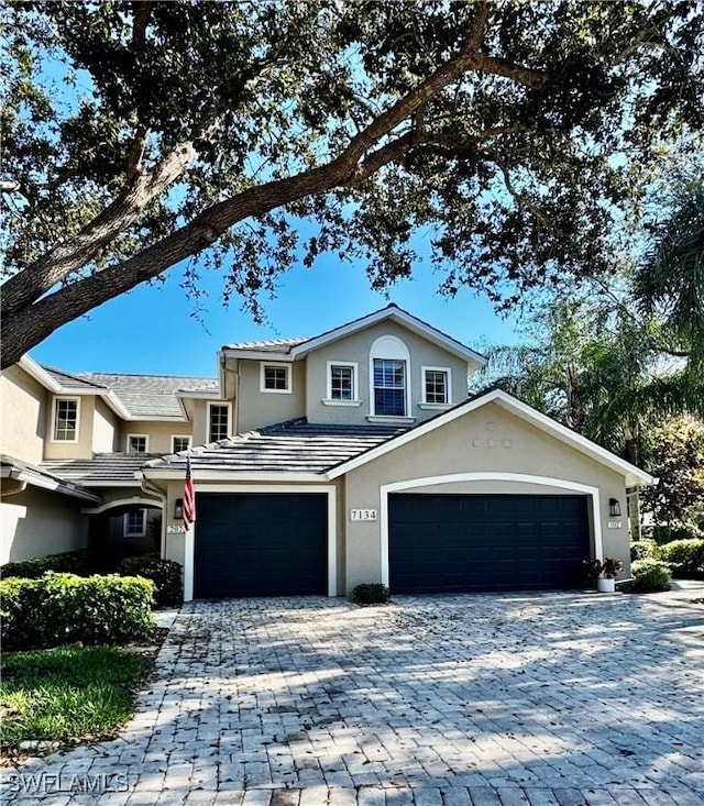 front of property featuring a garage