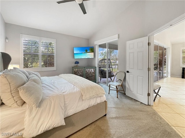 tiled bedroom with access to outside, ceiling fan, and vaulted ceiling