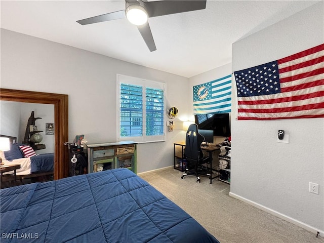 bedroom featuring ceiling fan and carpet flooring