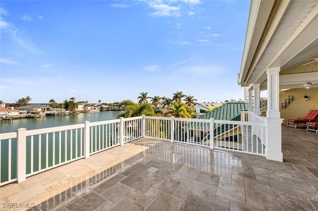 view of patio featuring a water view