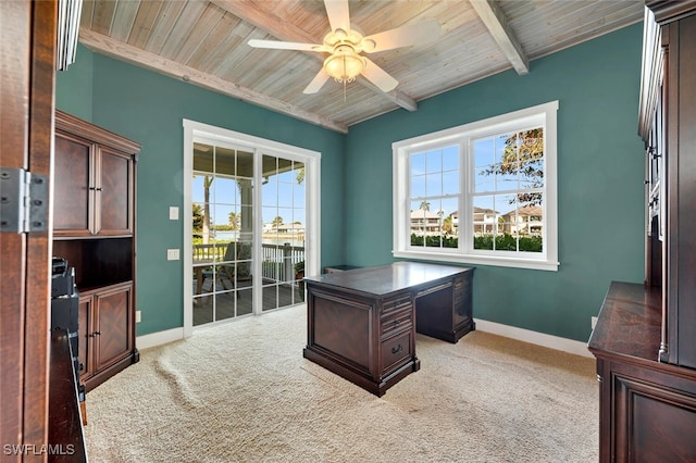 home office featuring light carpet, wooden ceiling, and beamed ceiling