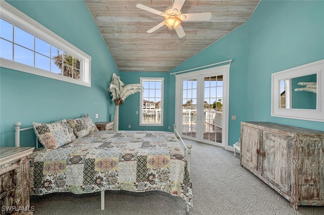 carpeted bedroom featuring lofted ceiling, access to outside, wooden ceiling, and french doors