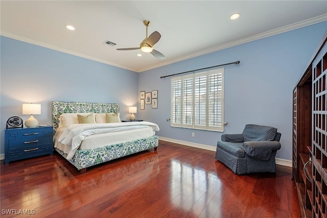 bedroom with crown molding, ceiling fan, and dark hardwood / wood-style floors