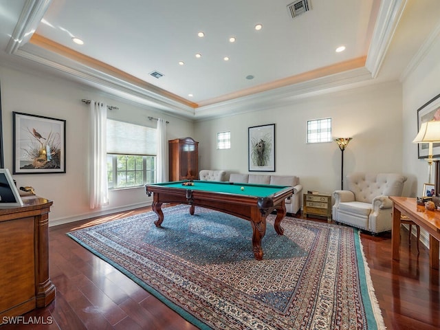 recreation room with crown molding, dark hardwood / wood-style floors, pool table, and a tray ceiling