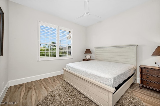 bedroom featuring ceiling fan and light hardwood / wood-style floors