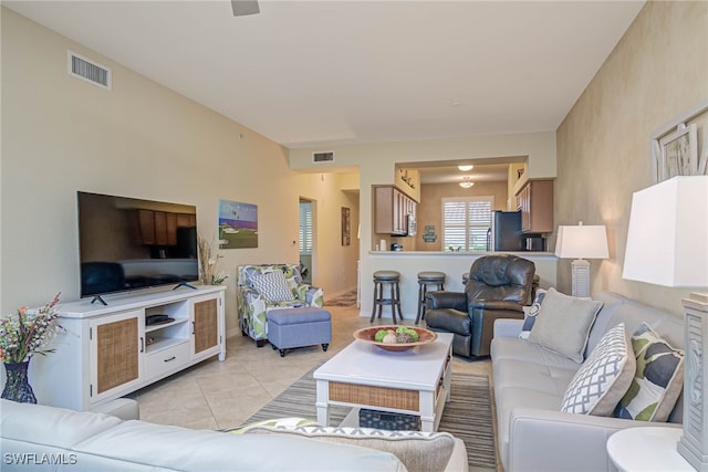 living room with light tile patterned floors