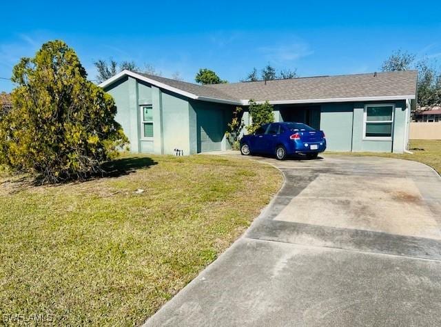 ranch-style house with a front lawn