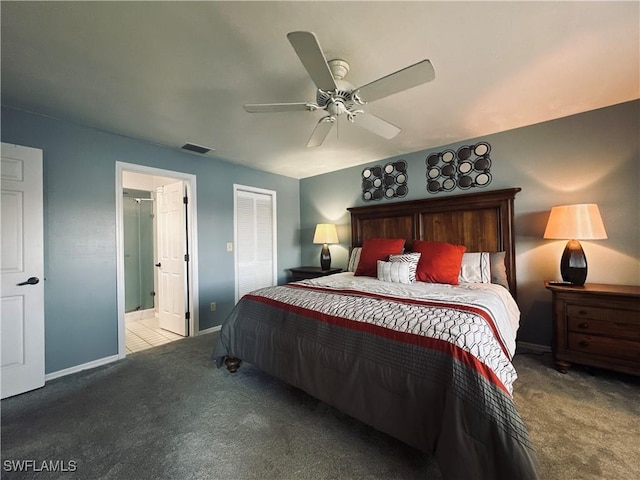 bedroom featuring carpet, ceiling fan, and ensuite bath