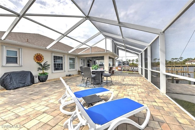 sunroom / solarium with lofted ceiling