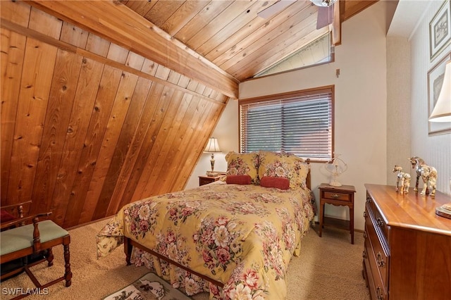 carpeted bedroom featuring lofted ceiling, wooden walls, and wooden ceiling