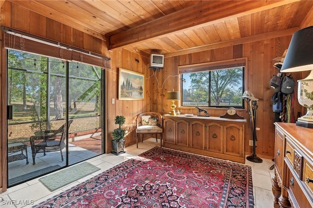 sunroom featuring beam ceiling and wooden ceiling