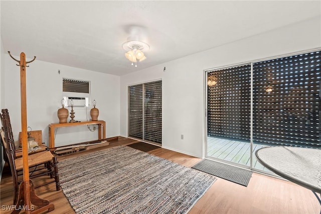 sitting room featuring wood-type flooring