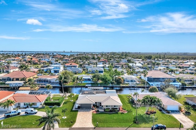 drone / aerial view featuring a water view