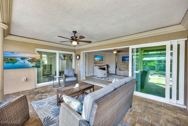 view of patio / terrace featuring ceiling fan