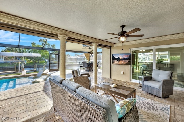 interior space featuring a healthy amount of sunlight and ceiling fan