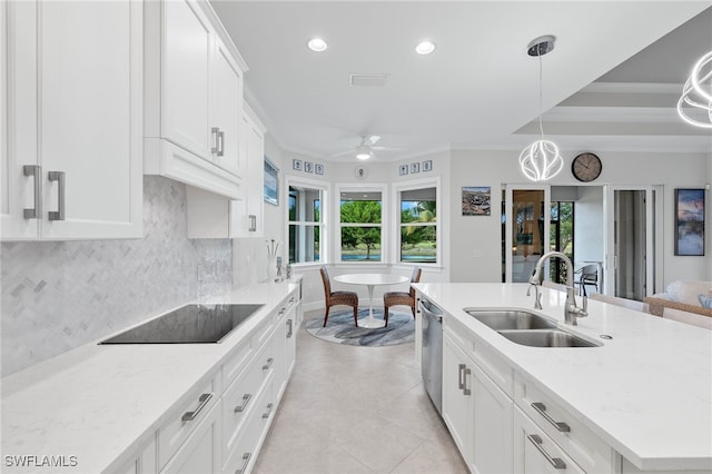 kitchen with tasteful backsplash, ornamental molding, a sink, dishwasher, and black electric cooktop