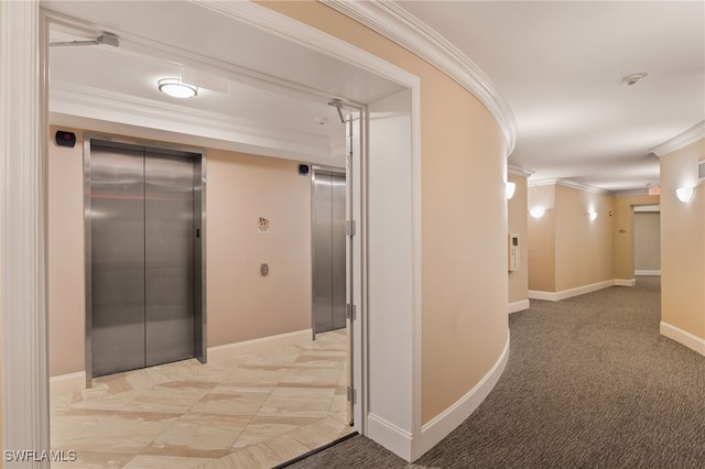 hallway with ornamental molding, light carpet, and elevator