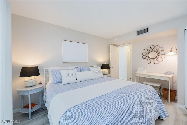 bedroom featuring light wood-type flooring