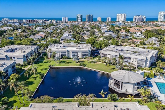 drone / aerial view with a water view